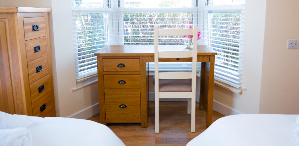 oak furniture in a bedroom